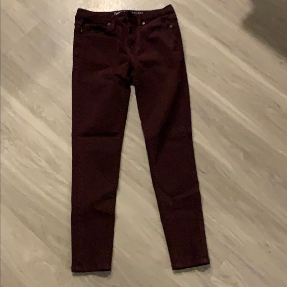 Burgundy high rise skinny jeans